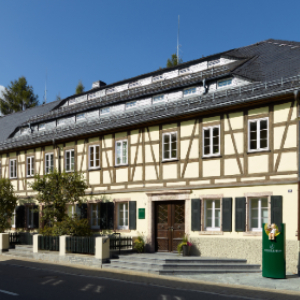 [Translate to Englisch (Intl):] Historisches Fachwerkhaus der Manufaktur in Grünhainichen