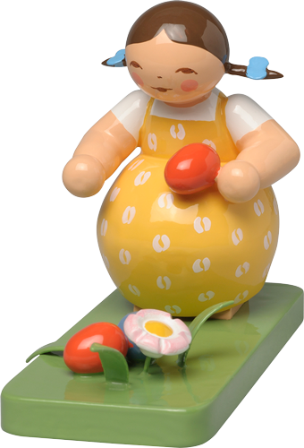 Girl finding Easter Eggs